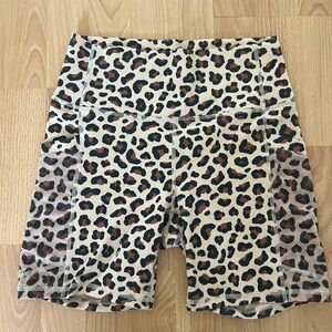 Fabletics Tan and Black Leopard Print Shorts
